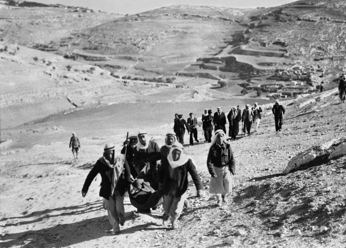 Picture released in January 1948 shows Palestinian Arabs leaving their village and neighborhoods of Jerusalem to march against a Jewish settlement in Palestine and fleeing the Haganah attack, during the 1948 ArabIsraeli War. On November 29, 1947, the United Nations