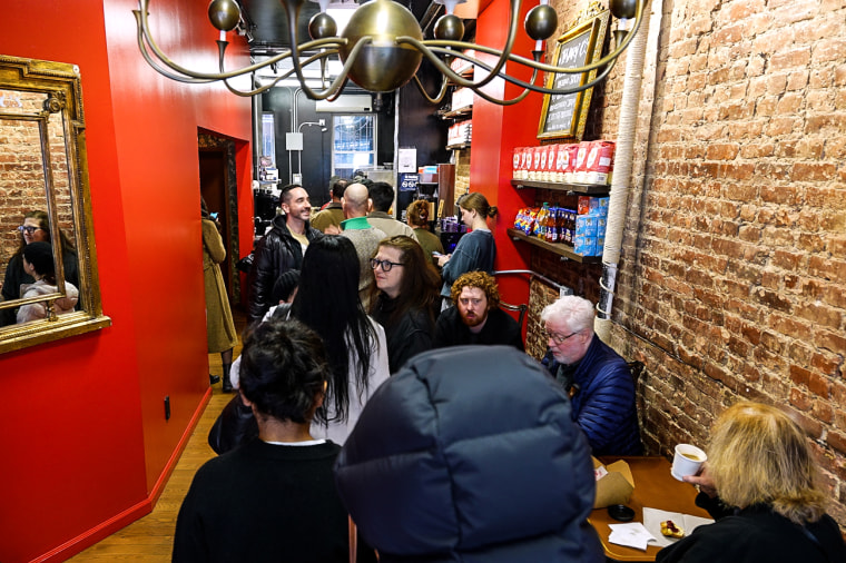 Customers line up inside the brick and motar Mary O